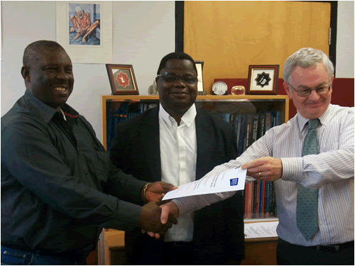 Prof. Ikomi receiving certificate of participation.
